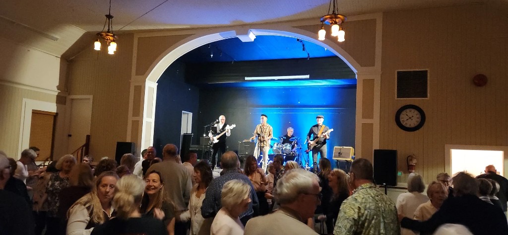 Pickleback playing a packed community hall dance